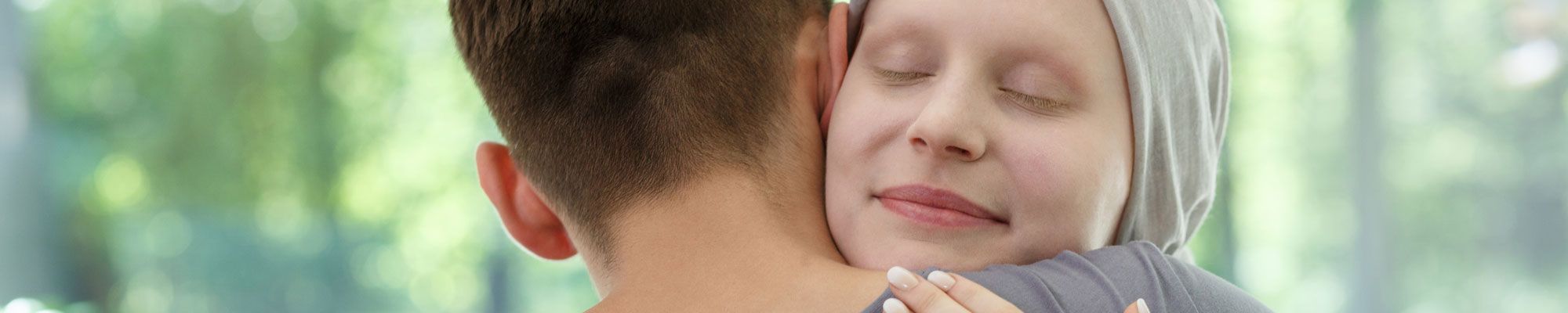 Lady wearing head scarf due to hair loss